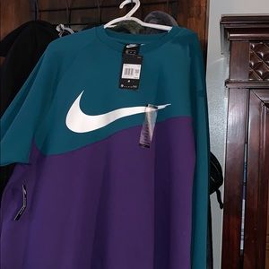 Nike sweatshirt. I believe it is unisex.